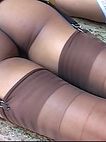 Kina pleasures her mistress by fulfilling her nylon stocking desires