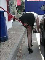 Flashing At The Garage Forecourt, Putting Air In The Tyres In Seamed Black Stockings