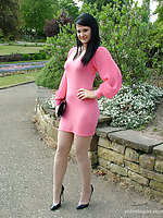 Cute brunette Elise works on your talisman debilitating a tight pink summer dress and shiny black stilettos